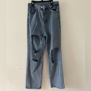 Selling some light washed ripped jeans